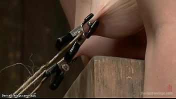 Brunette Slave Proxy Paige In Blue Lingerie Bound In Slightly Squat Position In Metal Device Gets Nipples Clamped And Tied Then Caned And Whipped thumbnail