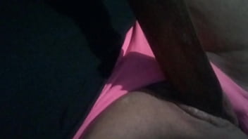 Playing with a dildo