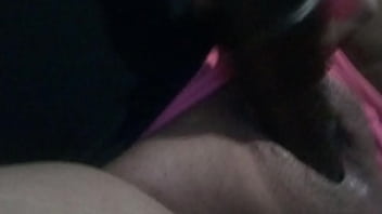 Playing with a dildo