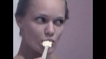 Blonde babe paints her tight juicy body