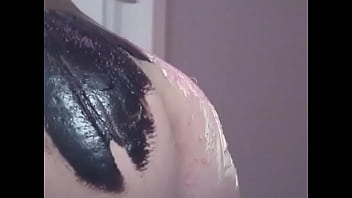 Blonde babe paints her tight juicy body