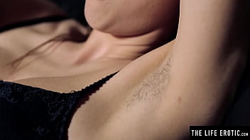 Cute brunette pisses over a mirror as she masturbates avidly