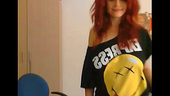 Redhaired redhead in t shirt strips off to nothing