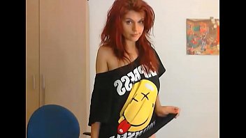 Redhaired redhead in t shirt strips off to nothing