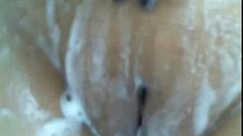 Big breasts being washed outdoors