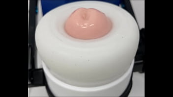 Sex robot doing a demo of some sex toys