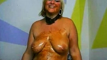 Kinky blonde milf playing with chocolate