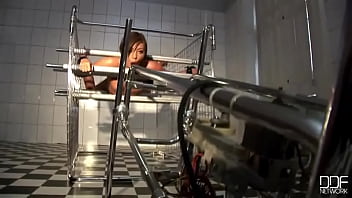 Natalia forrest gets bound in a cag