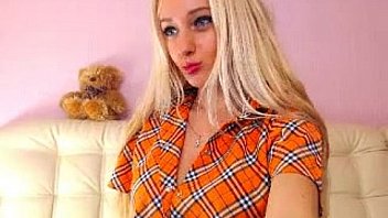 Teen wearing uniform plays with dildo on cam