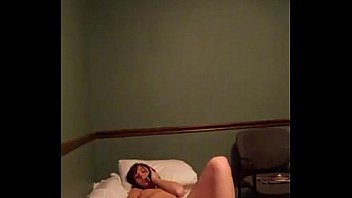Young girl recording masturbates on bed while talking on the phone Young girl recording masturbates on bed while talking on the phone