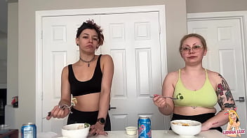 Two friends eat and belch