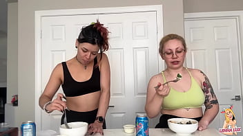 Two friends eat and belch