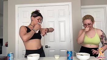 Two friends eat and belch