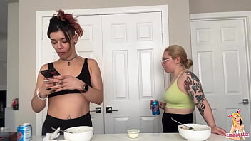 Two friends eat and belch