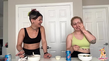 Two friends eat and belch