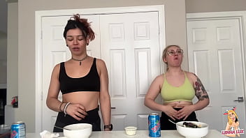 Two friends eat and belch