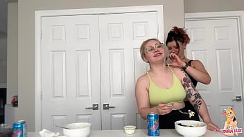 Two friends eat and belch