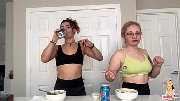 Two friends eat and belch