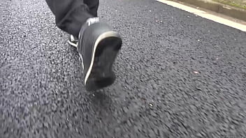 Walk on the road wearing fluffy sneakers