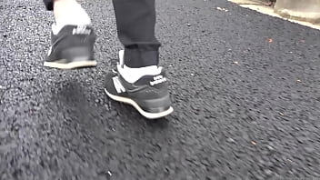 Walk on the road wearing fluffy sneakers