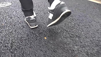 Walk on the road wearing fluffy sneakers