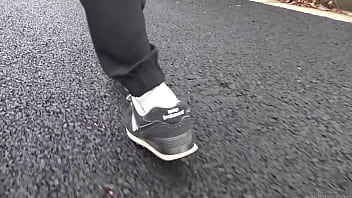 Walk on the road wearing fluffy sneakers