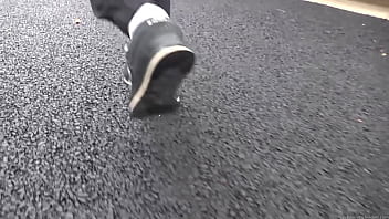 Walk on the road wearing fluffy sneakers