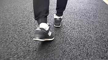 Walk on the road wearing fluffy sneakers