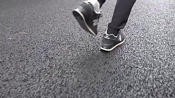 Walk on the road wearing fluffy sneakers