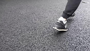 Walk on the road wearing fluffy sneakers