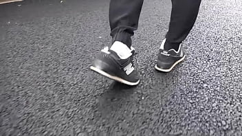 Walk on the road wearing fluffy sneakers