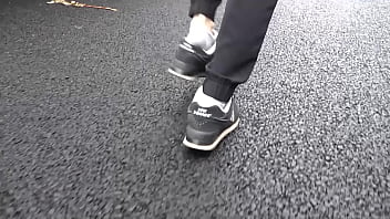 Walk on the road wearing fluffy sneakers