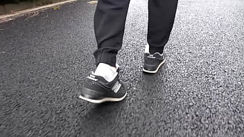 Walk on the road wearing fluffy sneakers