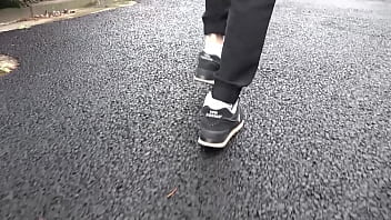 Walk on the road wearing fluffy sneakers