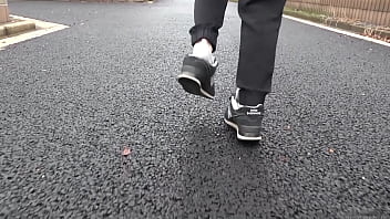 Walk on the road wearing fluffy sneakers