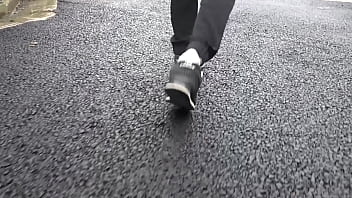 Walk on the road wearing fluffy sneakers