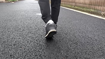 Walk on the road wearing fluffy sneakers