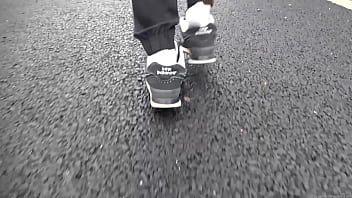 Walk on the road wearing fluffy sneakers