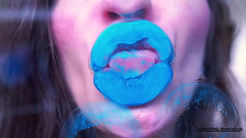 Wet red sticky lipgloss kiss