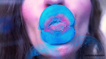 Wet red sticky lipgloss kiss