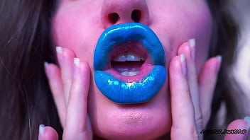 Wet red sticky lipgloss kiss