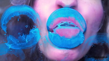 Wet red sticky lipgloss kiss