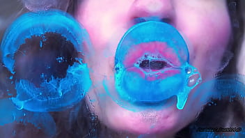 Wet red sticky lipgloss kiss