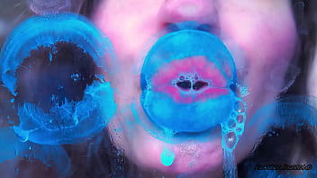 Wet red sticky lipgloss kiss