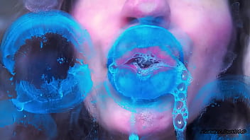 Wet red sticky lipgloss kiss