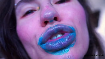 Wet red sticky lipgloss kiss