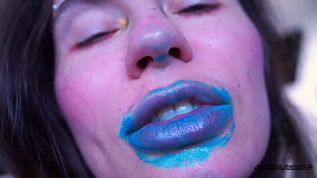 Wet red sticky lipgloss kiss