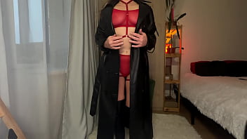 A sexy amateur wearing black high boots takes off her red lingerie and starts to masturbate using a butt plug and fake cock in her ass