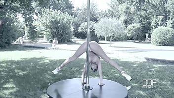 Busty miss lusty stripping in the stairway