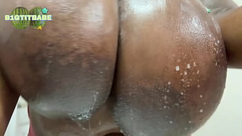 Big wet black tits washing sprinkles off